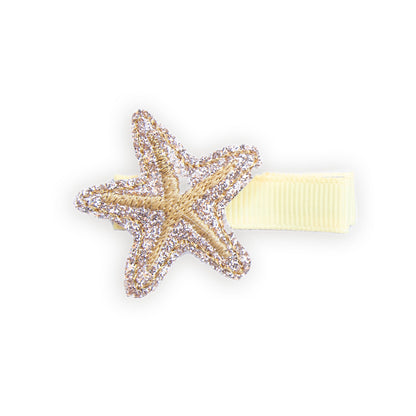 Barrette étoile de mer dorée anti-glisse pour enfant